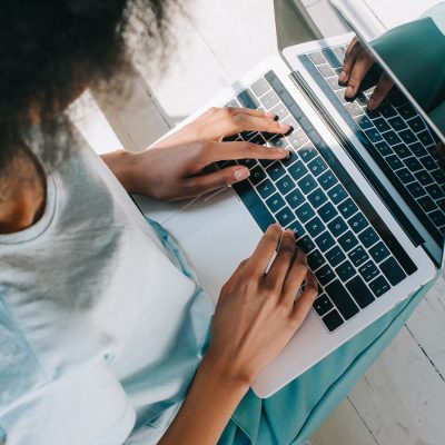 african-american-woman-typing-on-laptop-keyboard-o-2023-11-27-05-13-32-utc